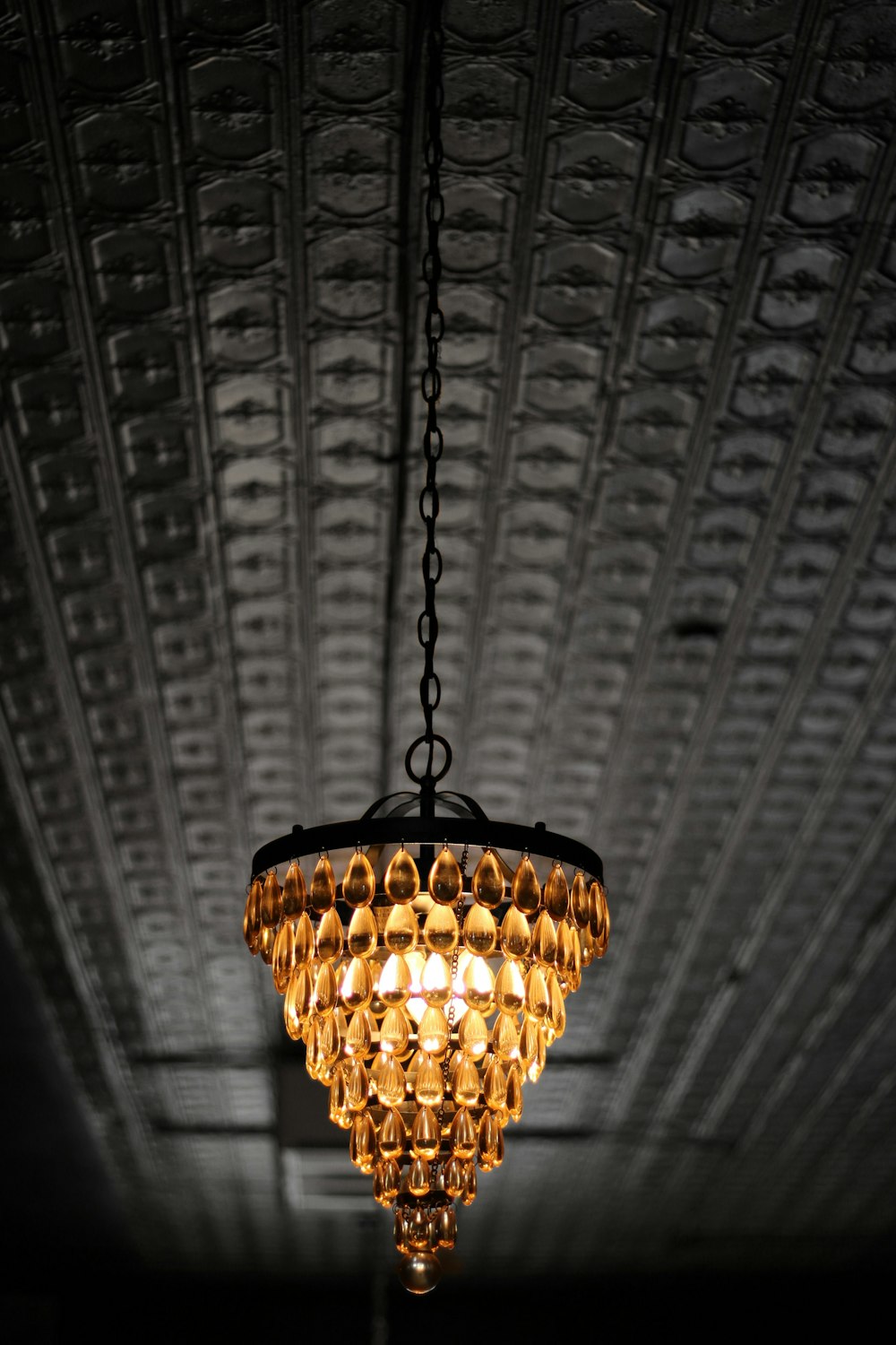 turned-on brown pendant light