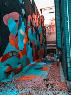 high-rise buildings with artwork