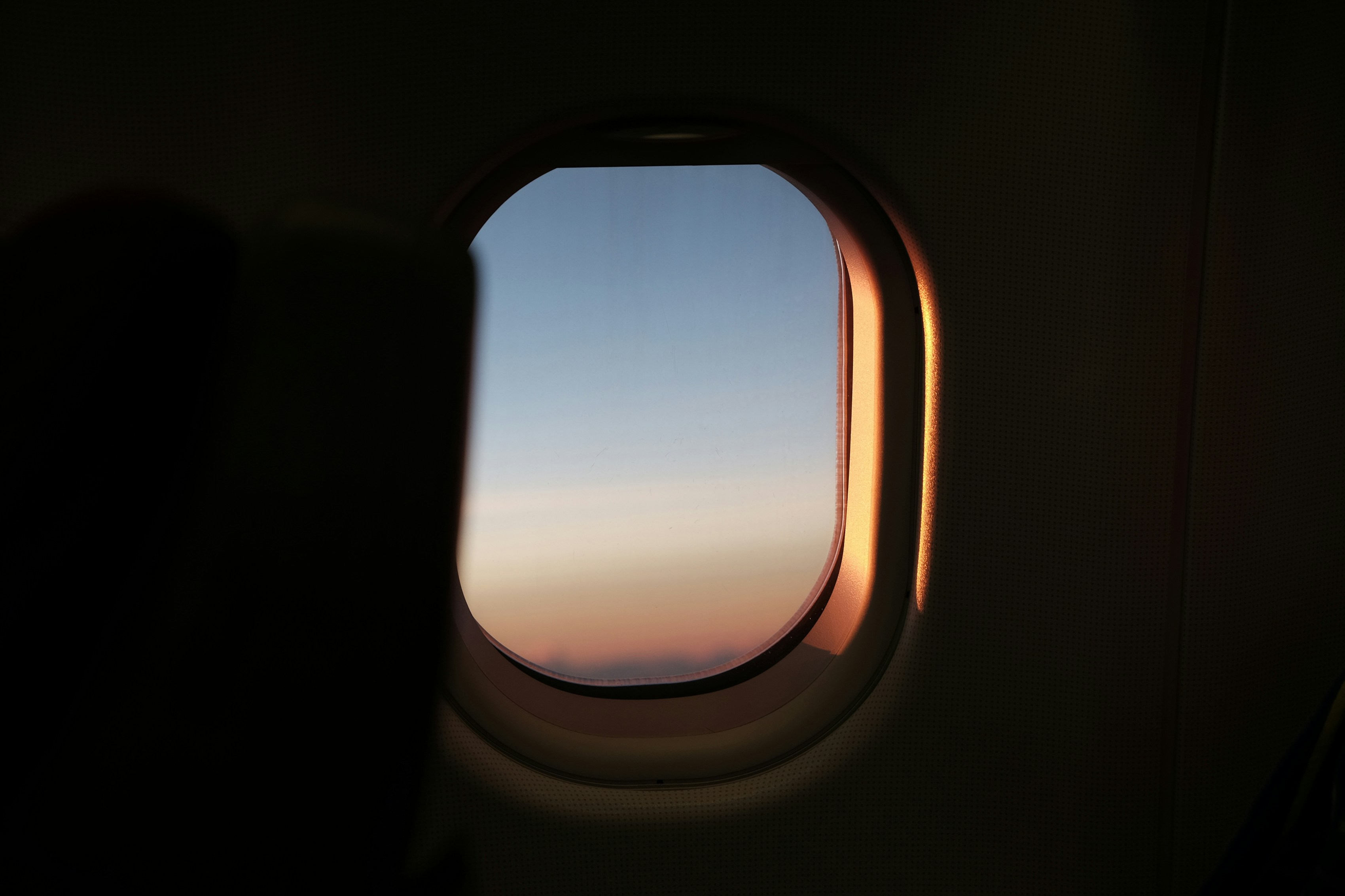 plane window, It’s my first time travel alone, heading to Japan and look at the window. It’s a good view of starting this trip.