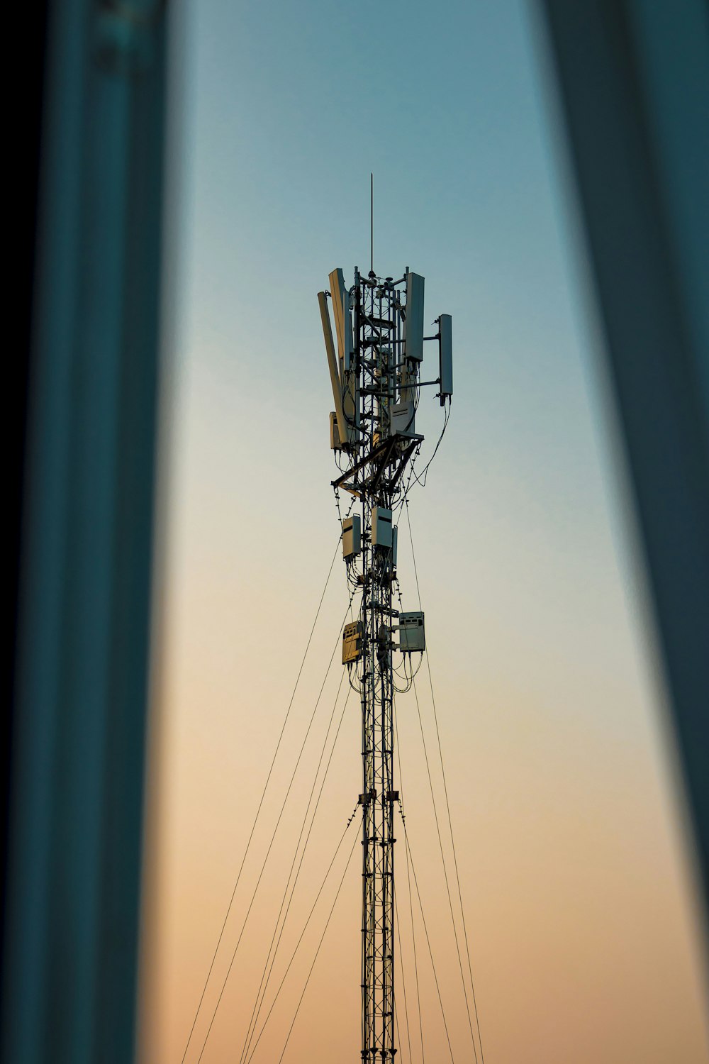 grey metal tower during daytime