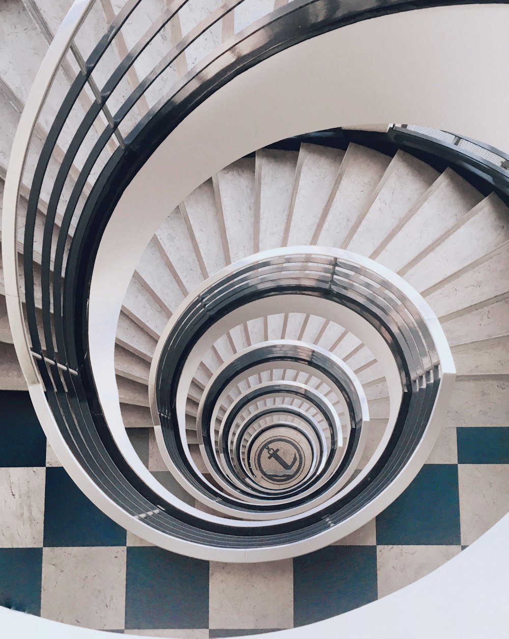 white and gray spiral stairs with no people
