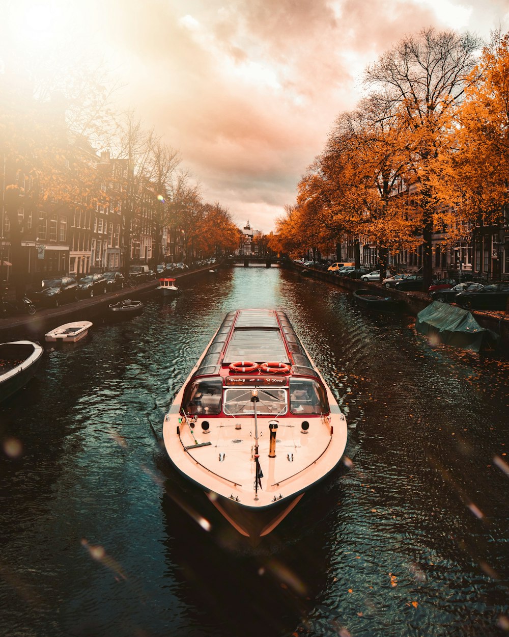 white motorboat on body of water