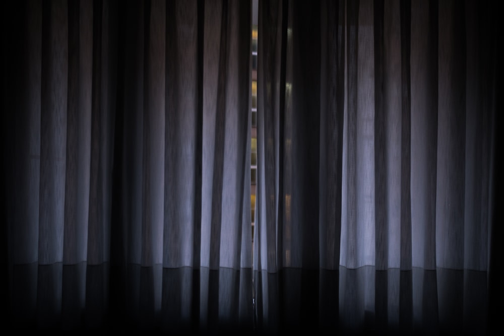 closed gray window curtain