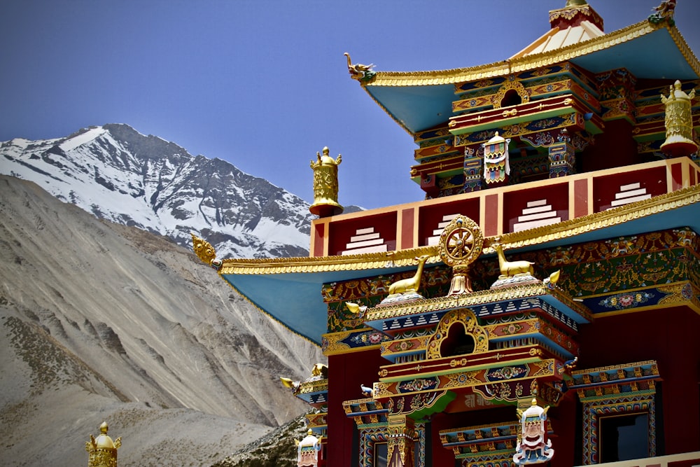 multicolored temple near mountain view