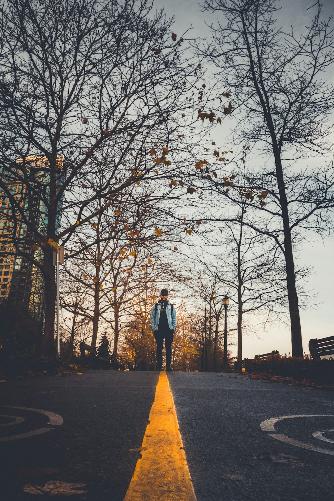 man standing on the street photo – Free Image on Unsplash