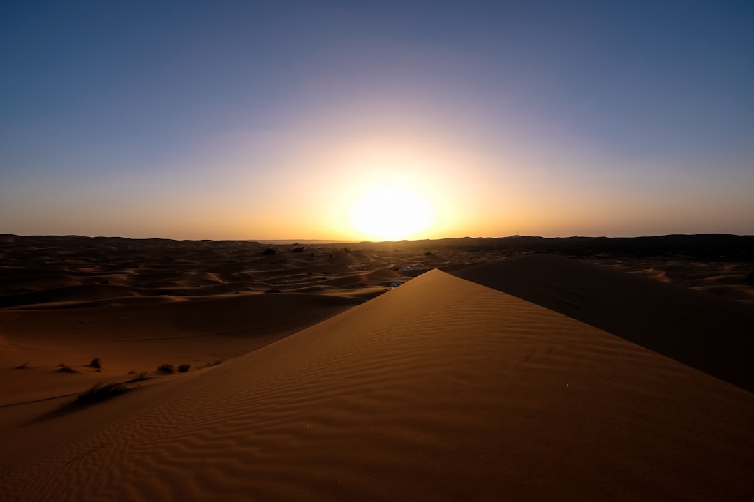landscape photography of sand during sunset