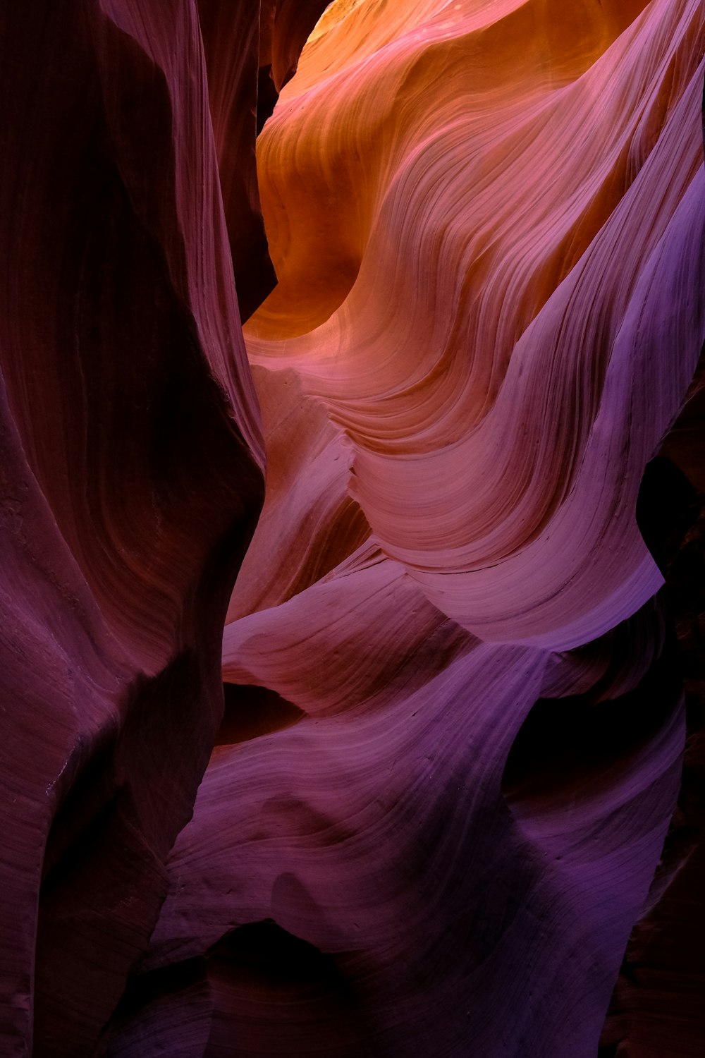 a large canyon with a very colorful rock formation