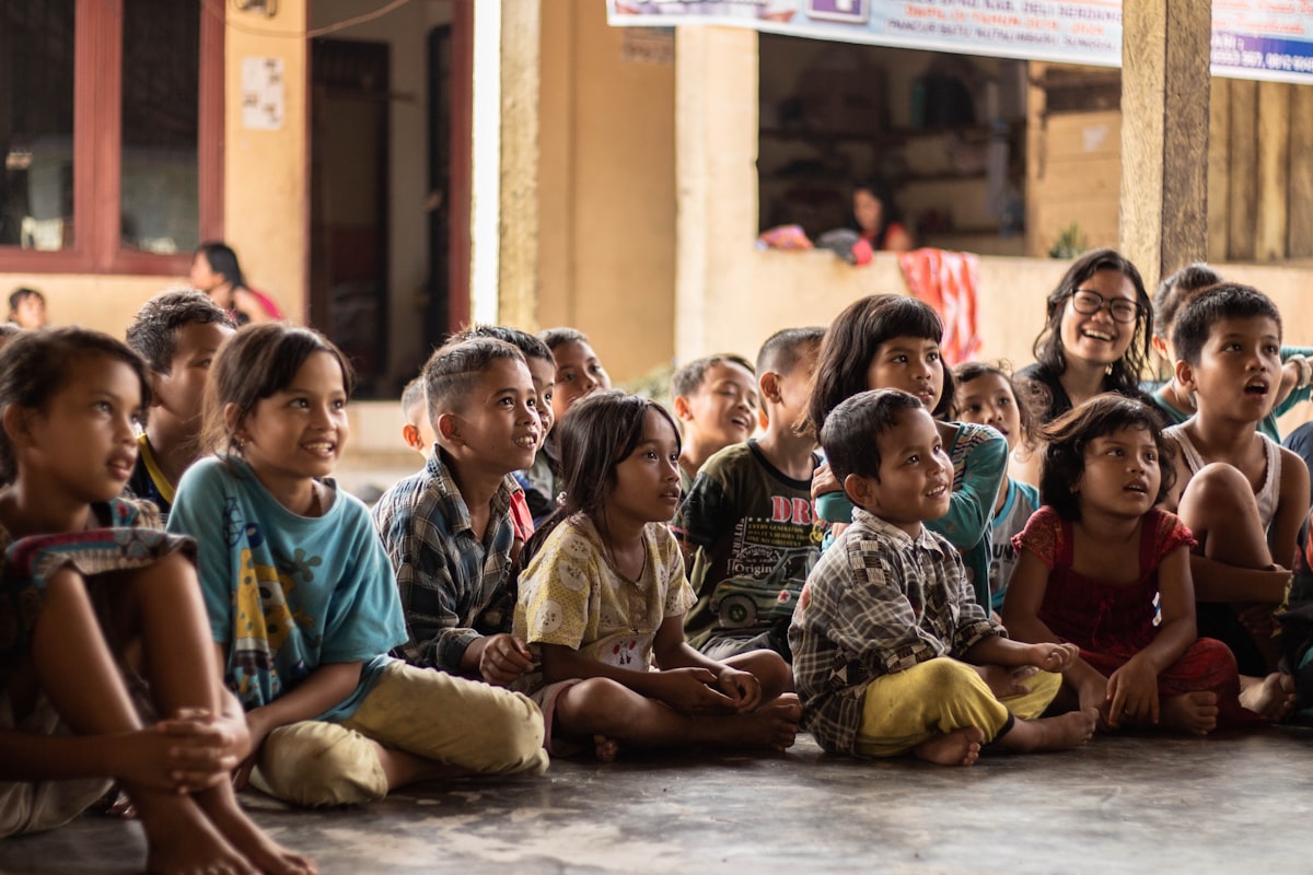 Children receiving fruits