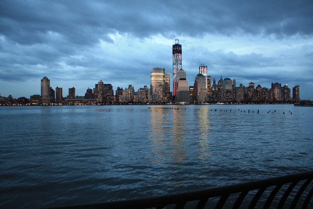 buildings surrounded with body of water