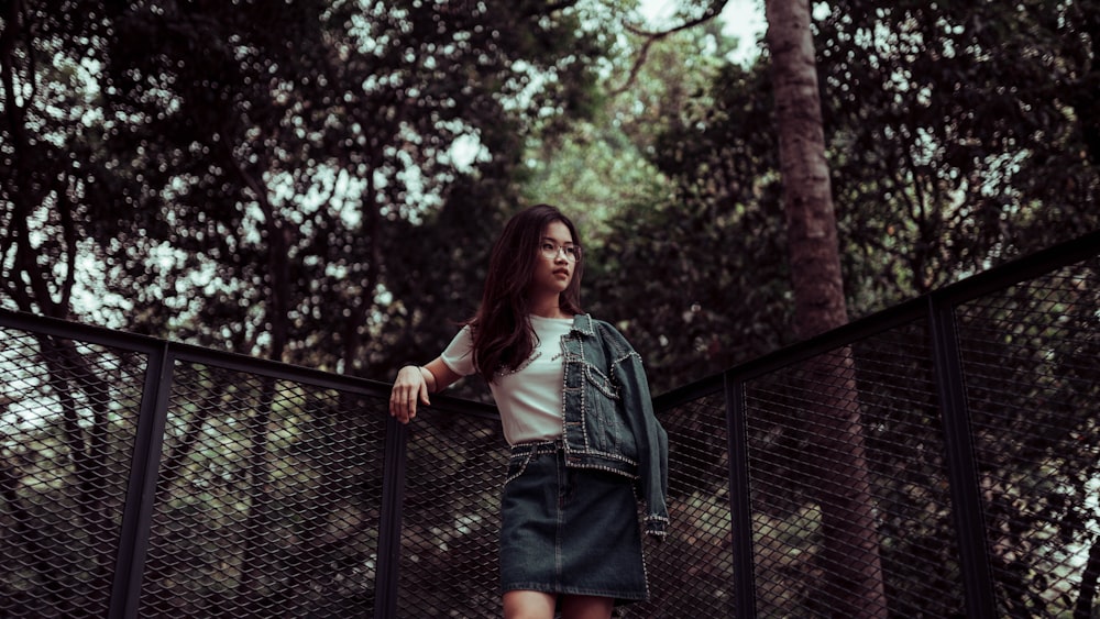 woman standing on forest