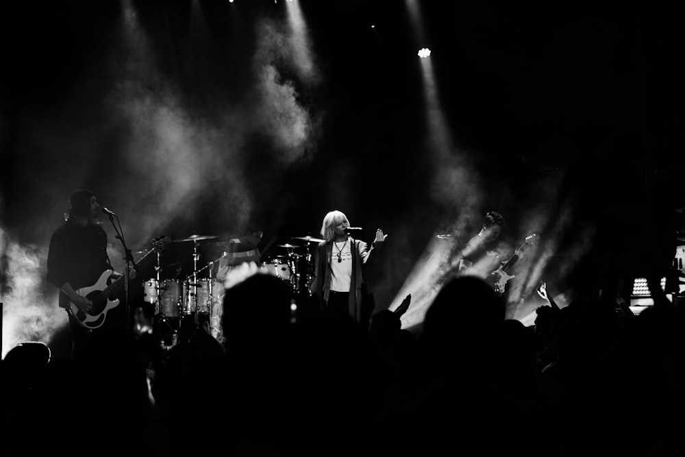 group of band performing at stage