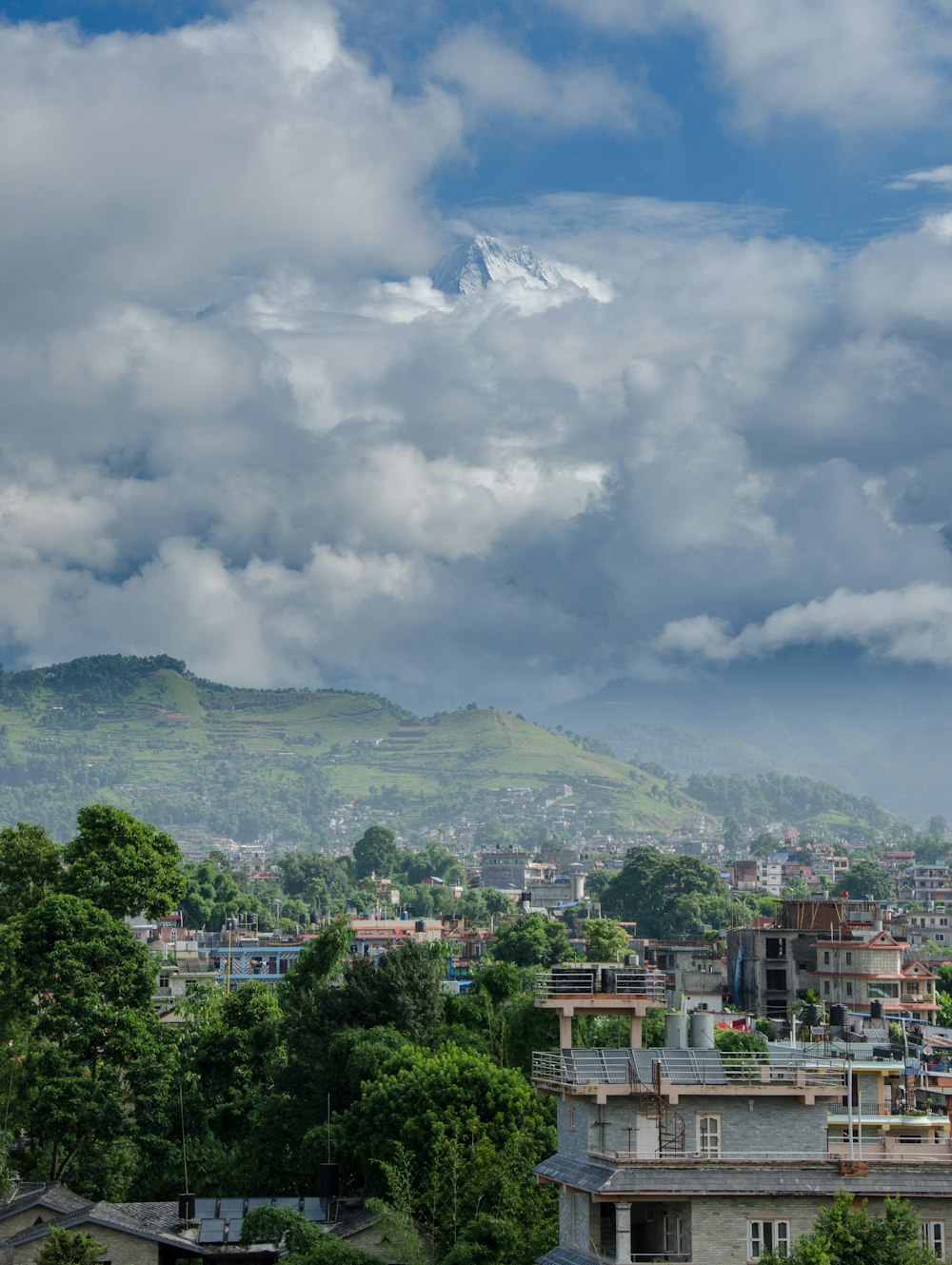 a view of a city with a mountain in the background