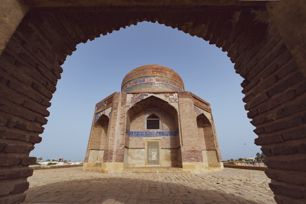 a view of a building through an archway