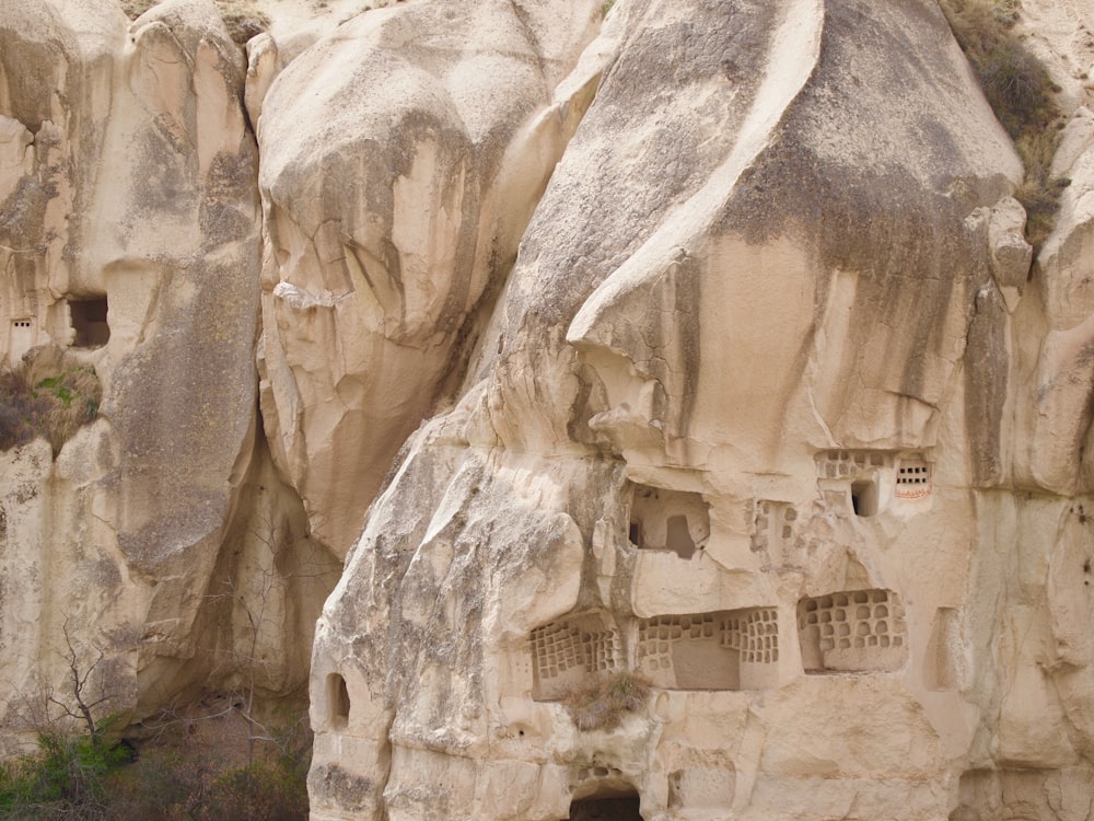 beige rock formation at daytime