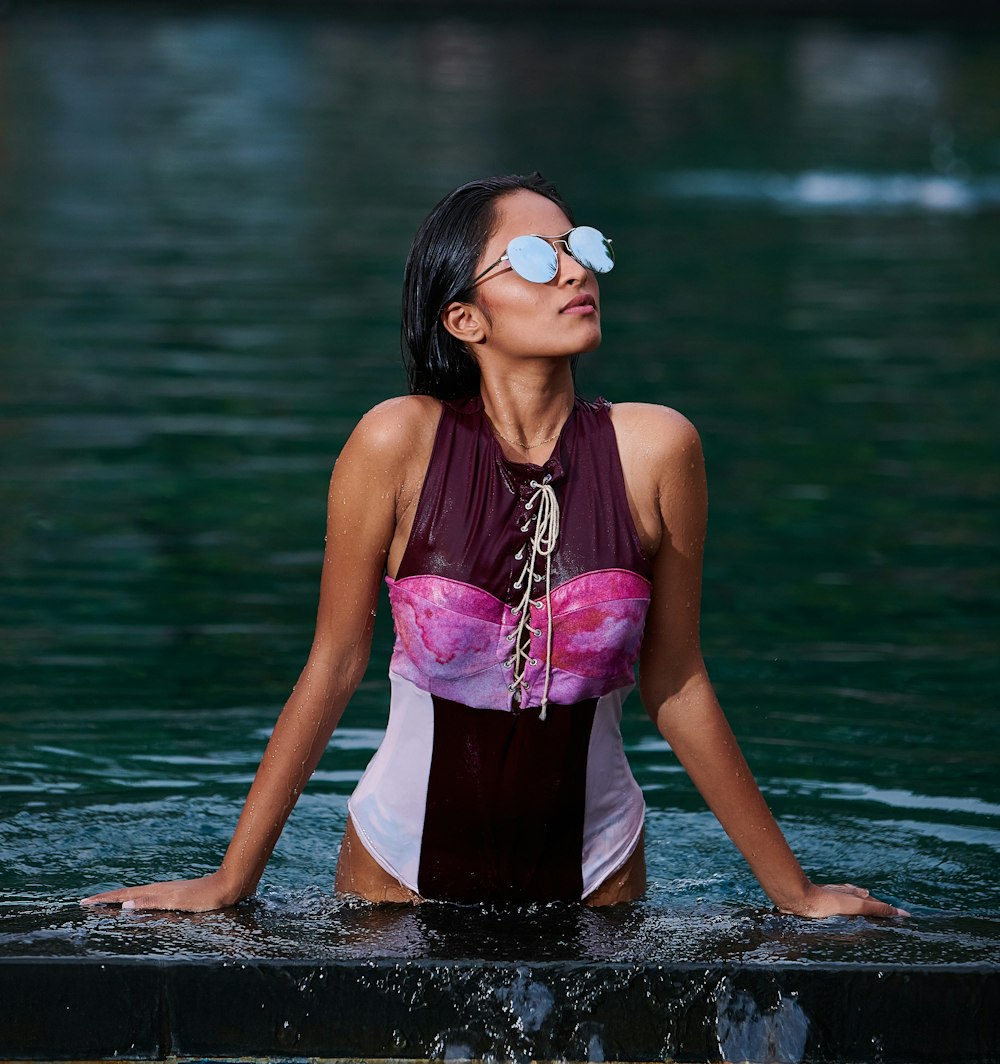 woman wearing bikini and sunglasses
