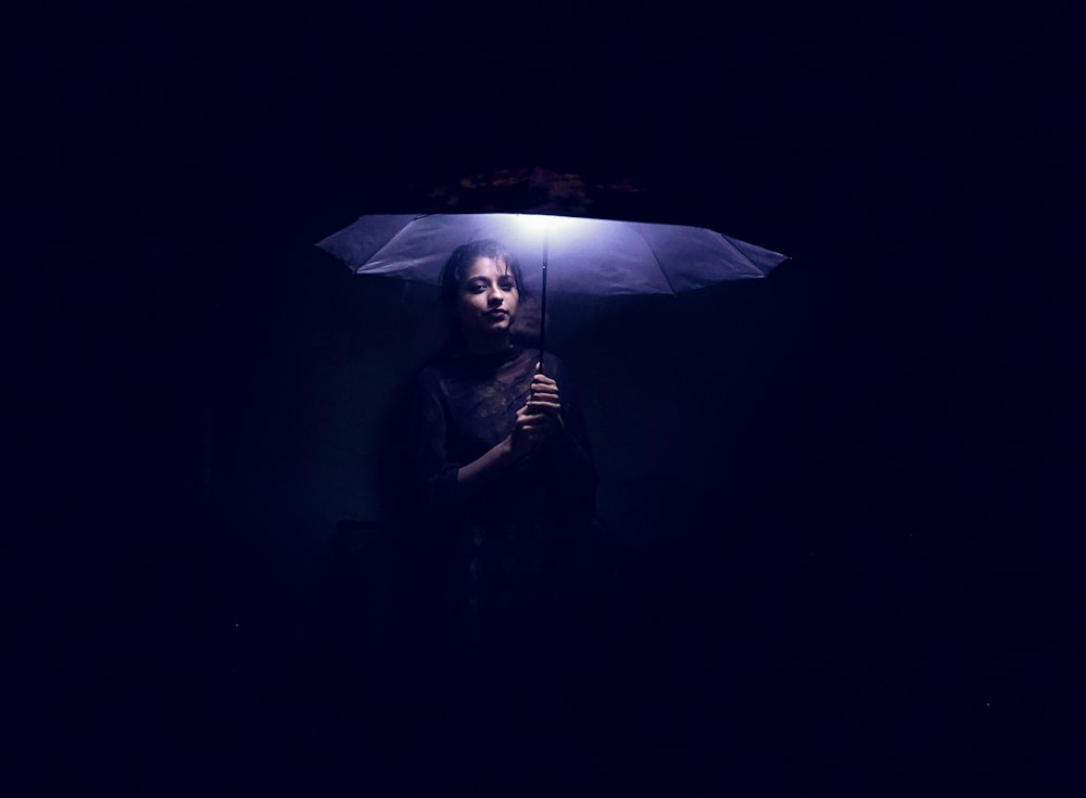 woman holding umbrella