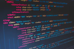 Colourful lines of code on a dark editor screen