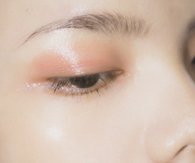 a close up of a woman's eye with makeup