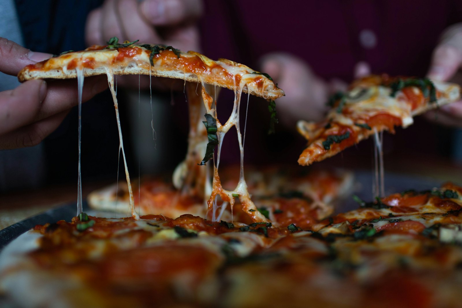 Friends sharing slices