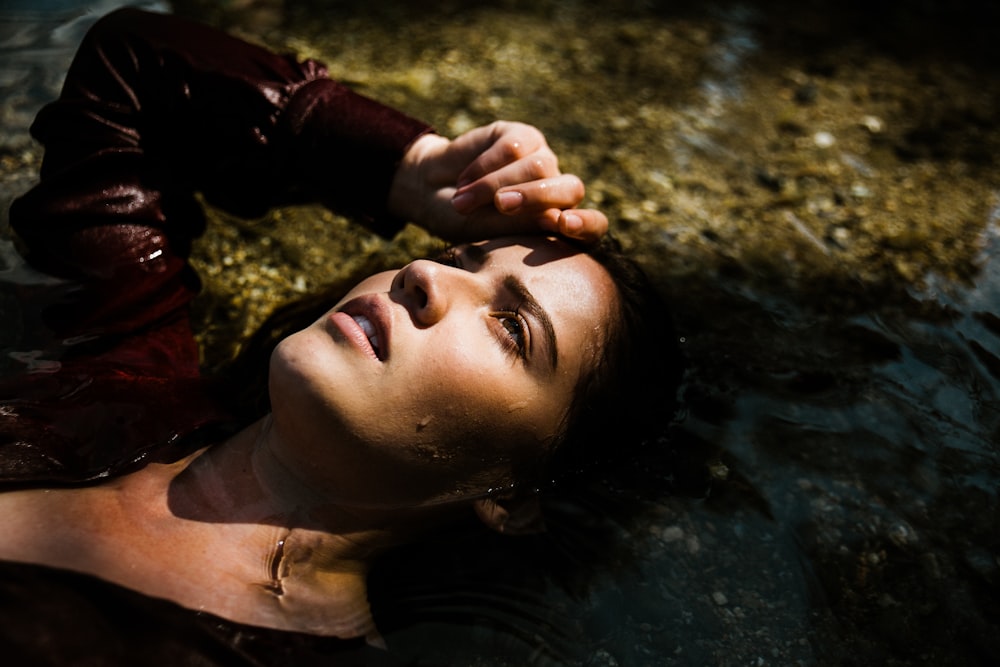 woman lying on ground