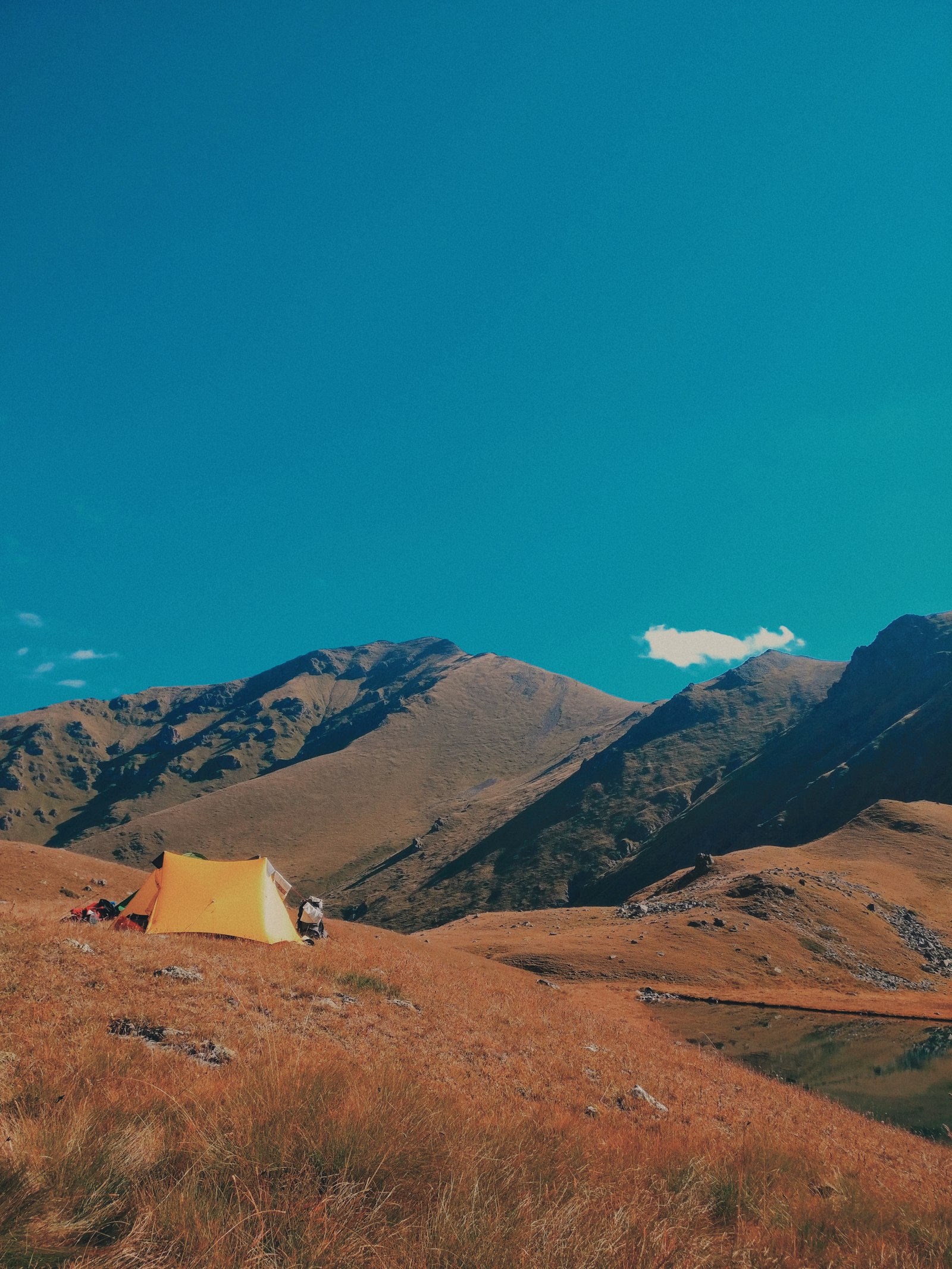 OnePlus A3010 sample photo. Orange tent on mountain photography