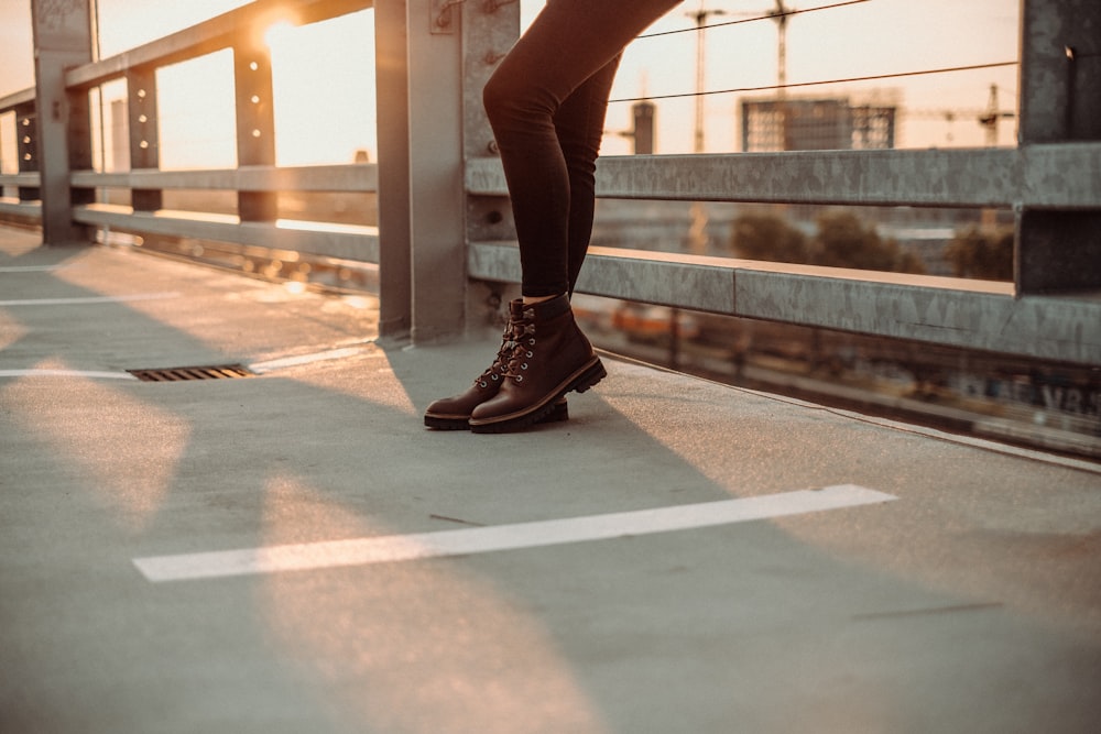 woman in brown leather work boots