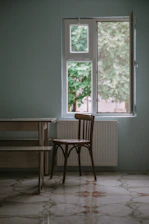 empty chair near window