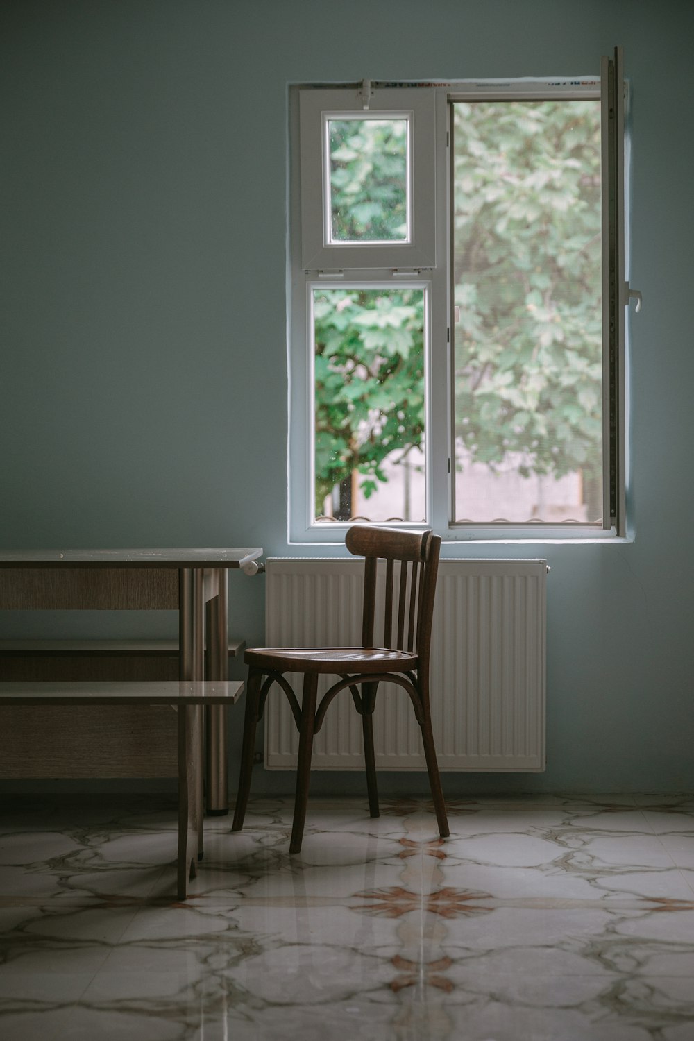 empty chair near window