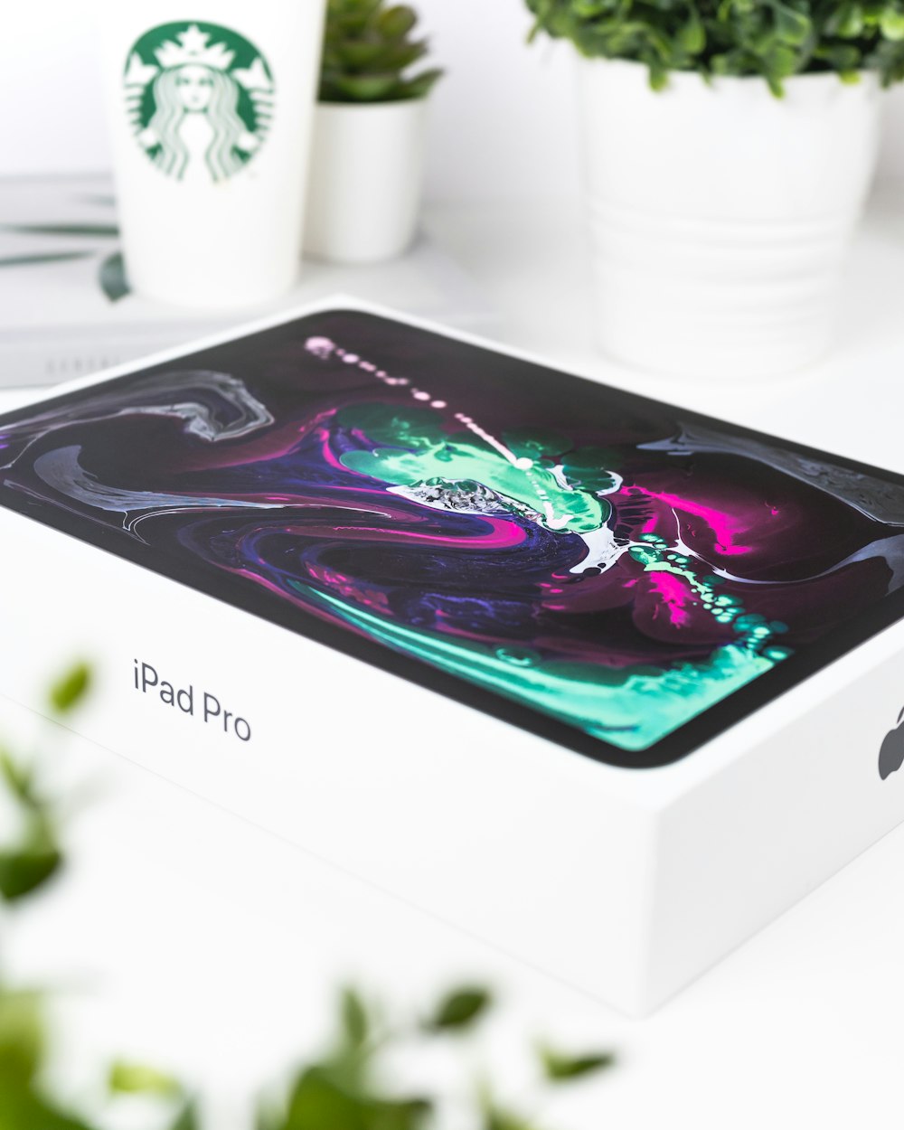 white and black iPad Pro box