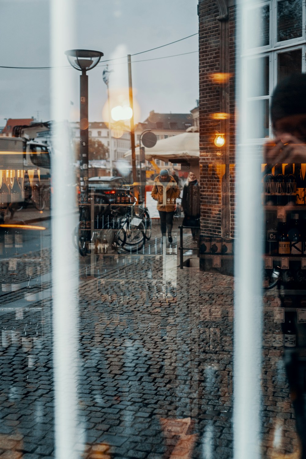 woman walking on sidewalk