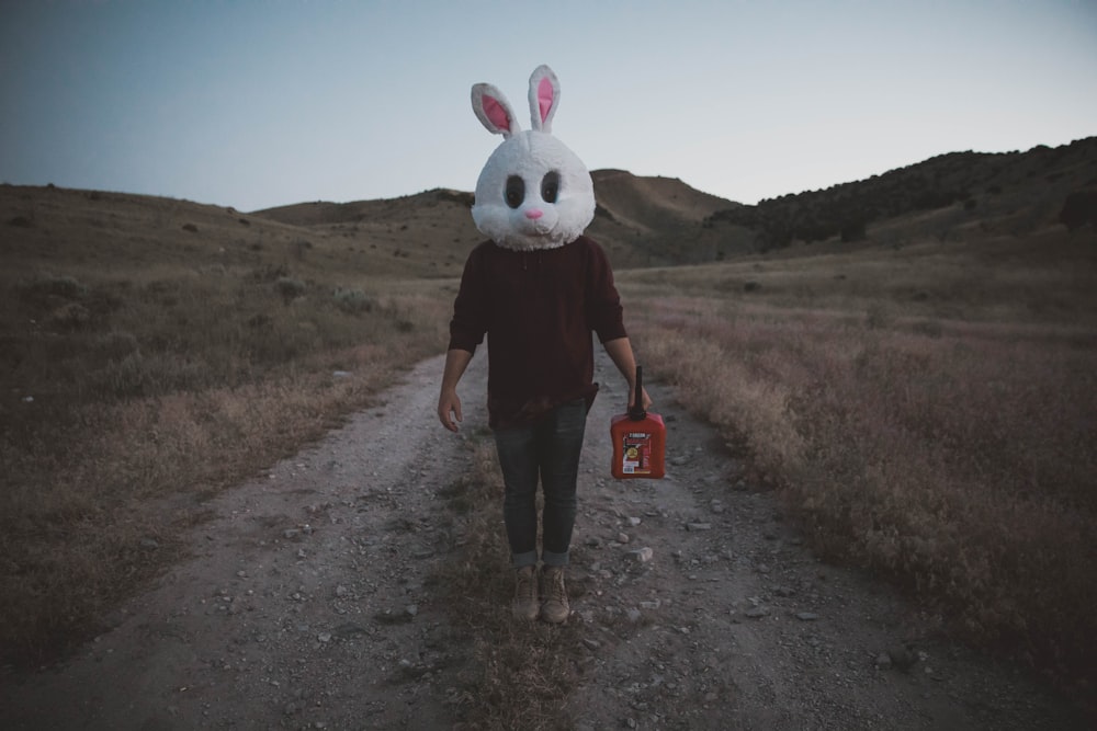 man wearing bunny head costume
