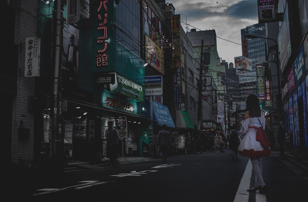 woman standing on road