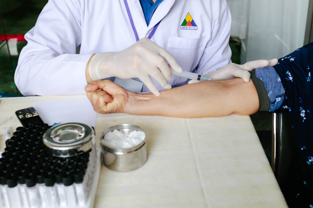 woman holding syringe