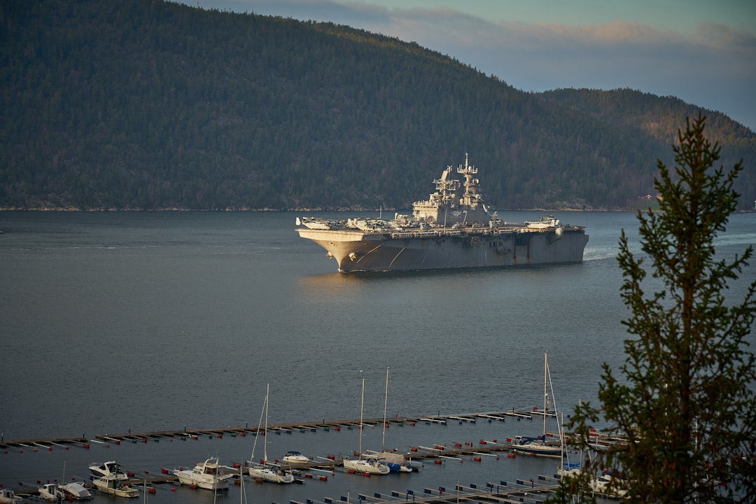 white ship on body of water, USS Iwo Jima
