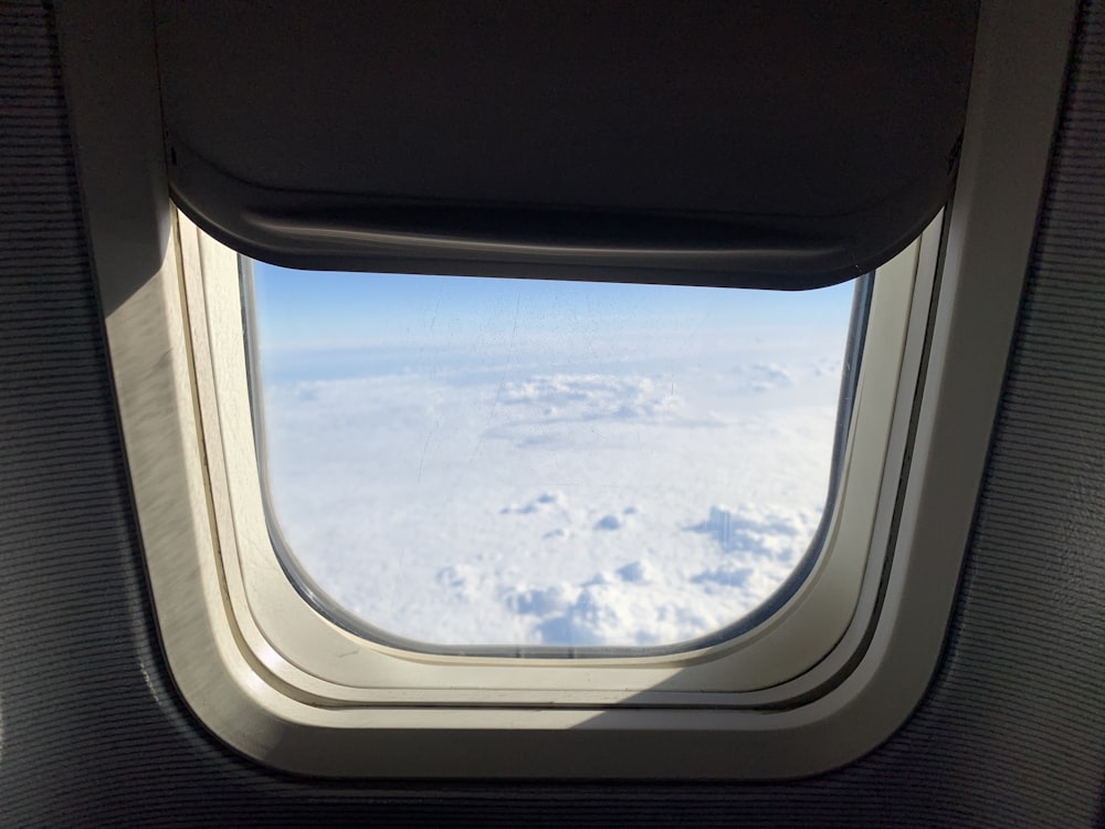 view of clouds through window