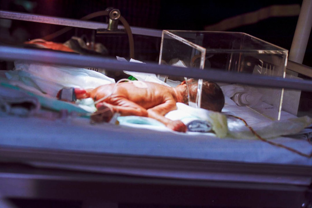 A young infant in an incubator