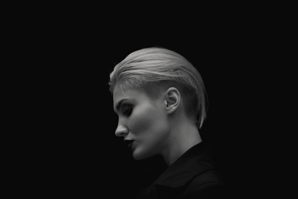 grayscale photography of woman in collared shirt