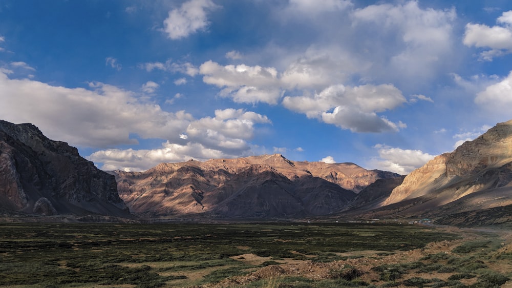 view of mountain landscape under cloudy sky