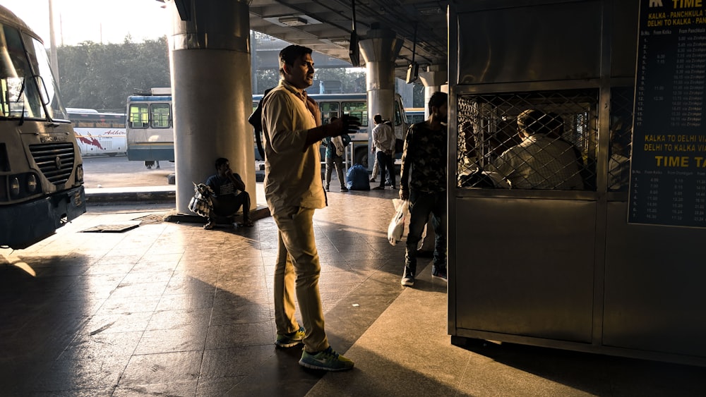 men at the bus station