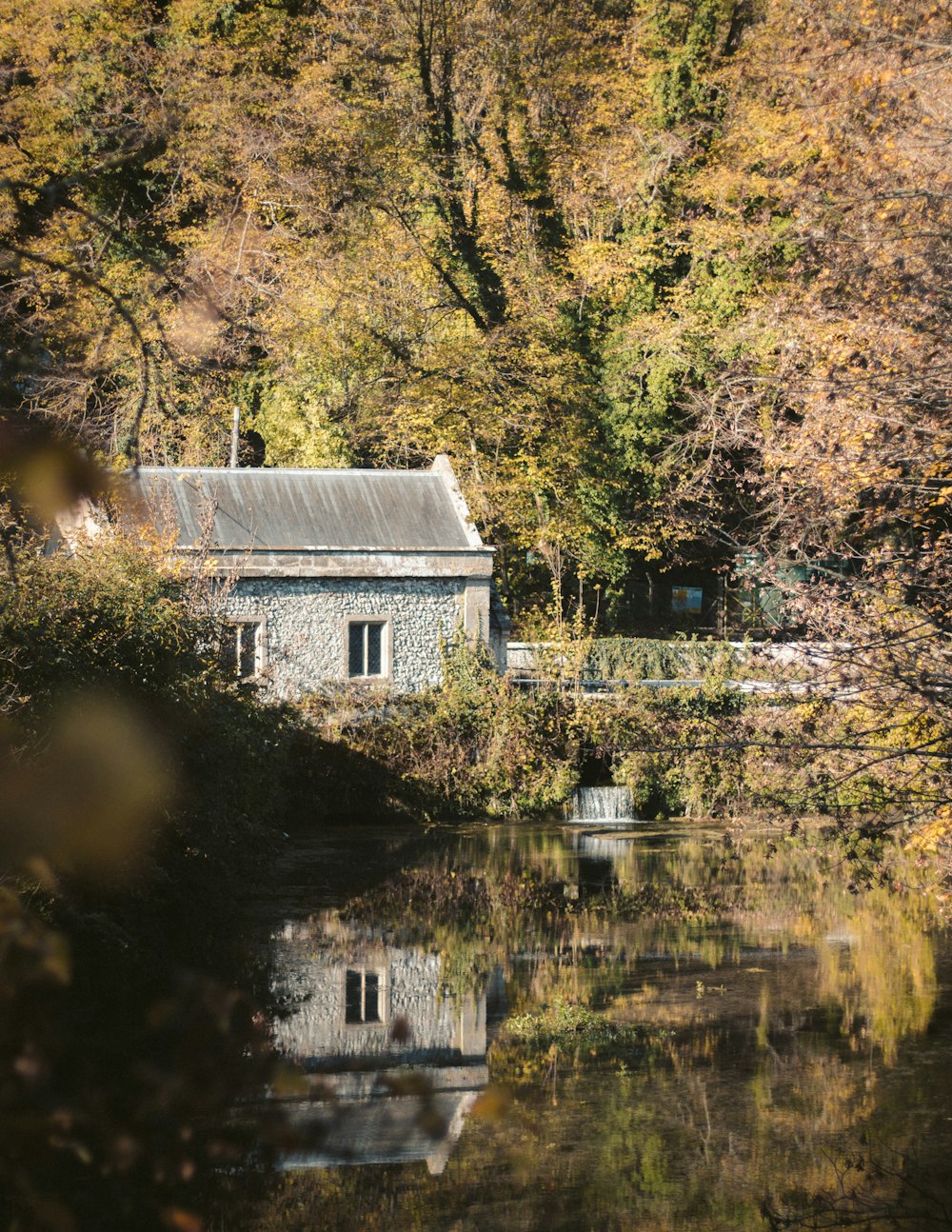 concrete house beside river