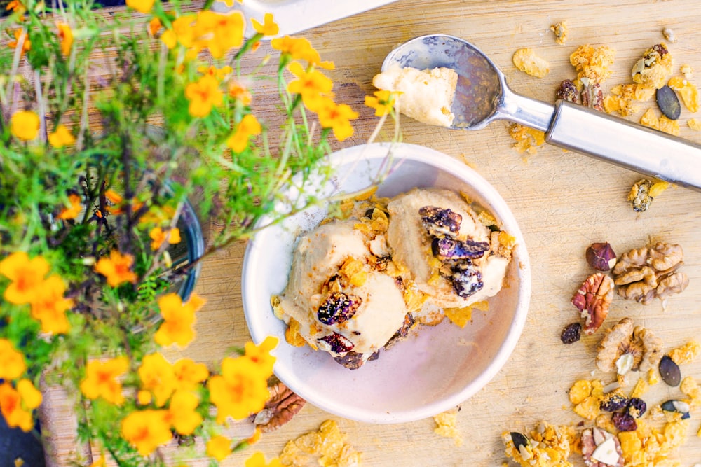 ice cream with nuts on bowl