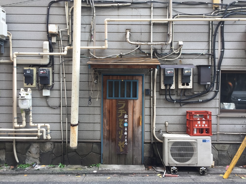 closed brown wooden door during daytime