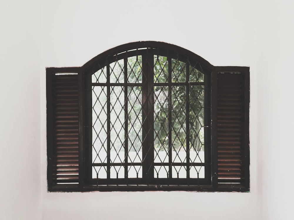 closing black wooden window