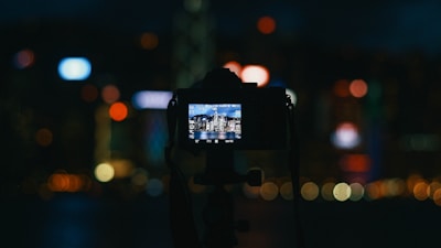 bokeh photography of digital camera