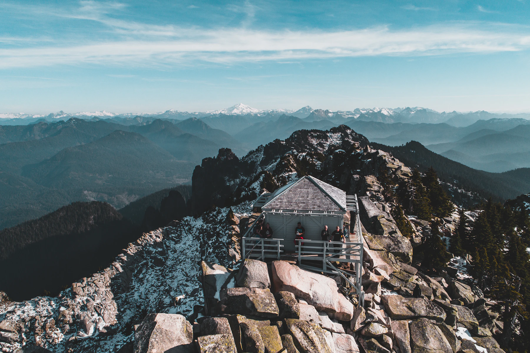 An alpine lookout above rugged mountain ridges