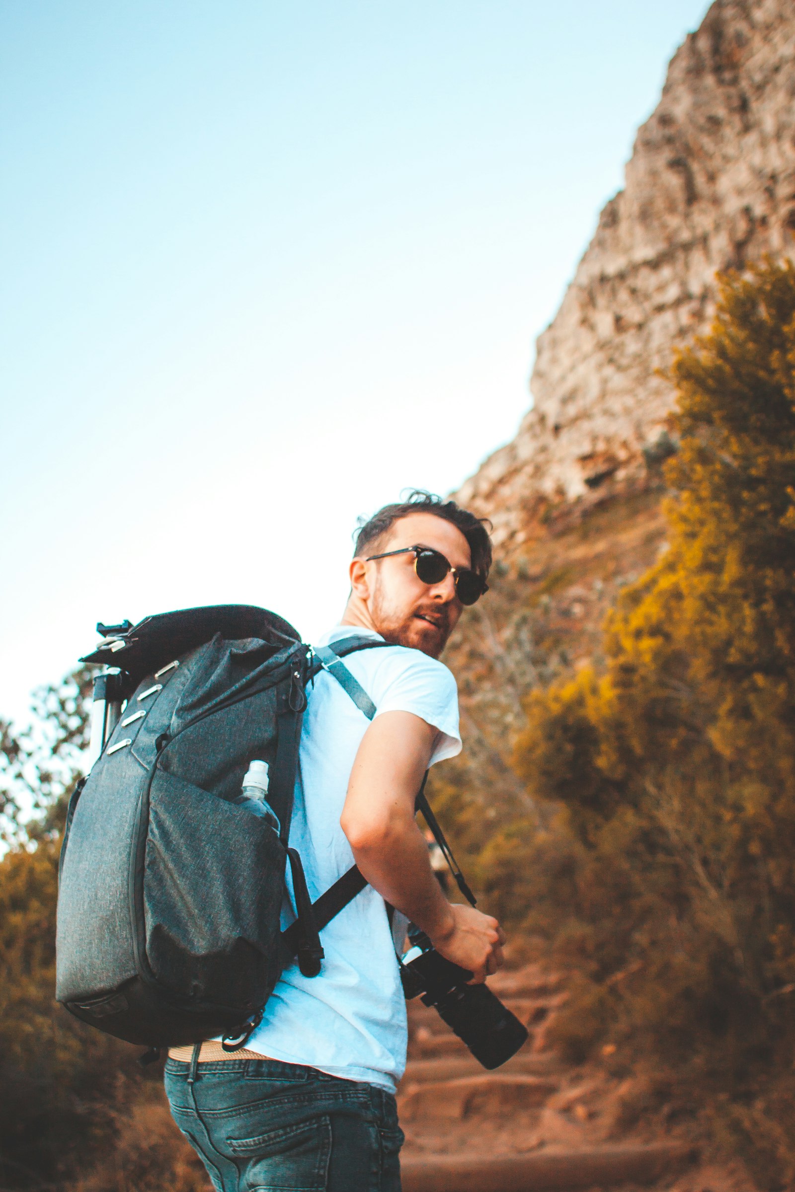 Canon EF 28mm F1.8 USM sample photo. Man walking on pathway photography