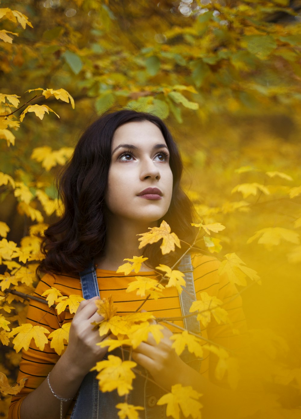 woman standing on yellow flowers