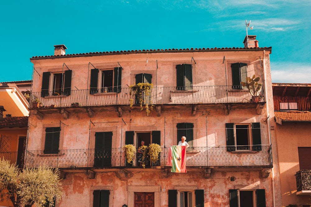 3-storey house with flag