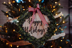 selective focus photo of Happy Holidays board decor