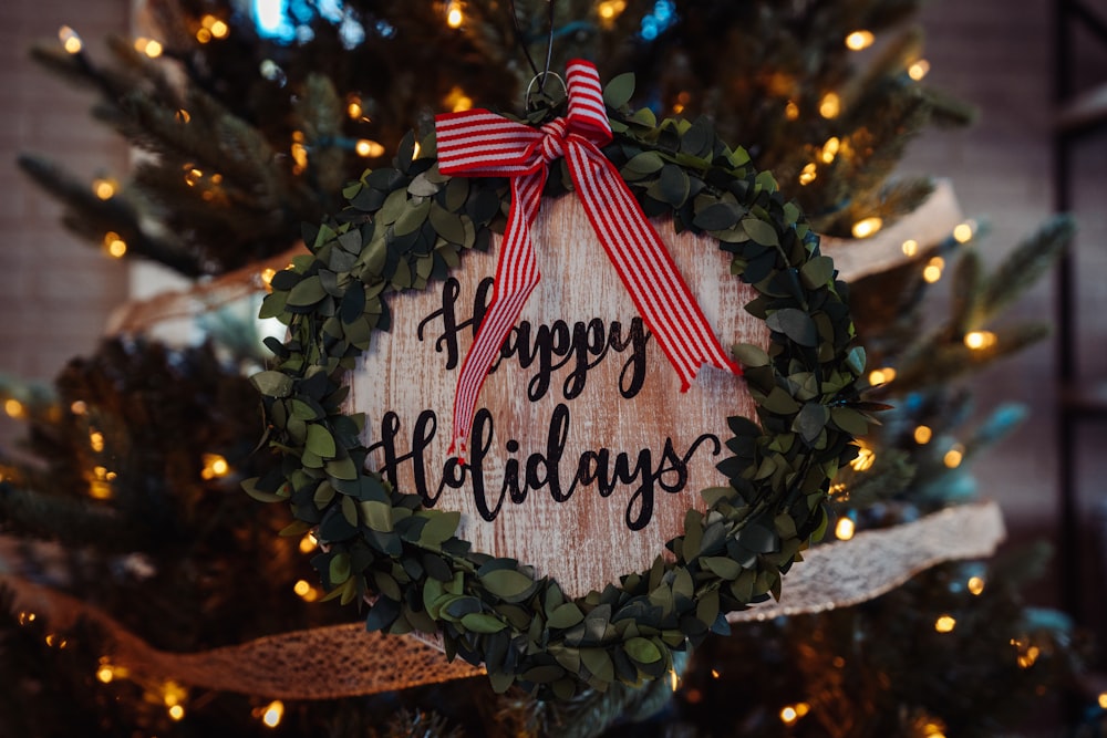 selective focus photo of Happy Holidays board decor